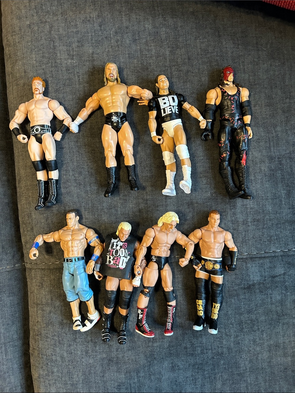 WWE Collectible Action Figure 8 lot - Black, White, Blue, Red, Tan